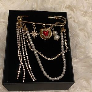 Gold and Red Charm Brooch